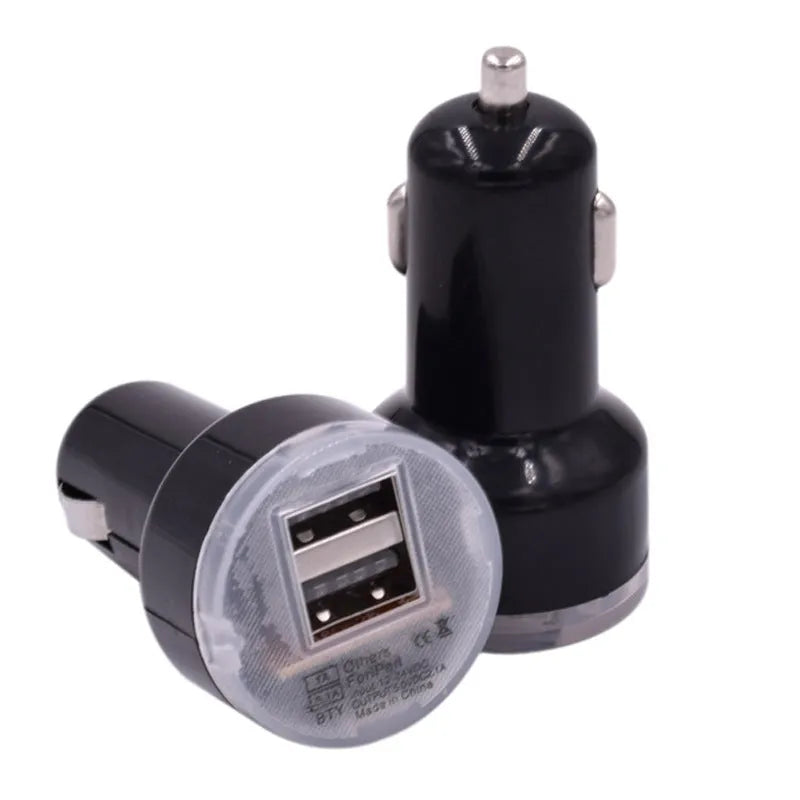 Black and white two-port car charger for a 12V vehicle socket, used for charging phones in the car