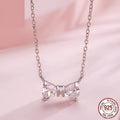 925 sterling silver bow pendant necklace on O-ring clavicle chain in colour BSN434, 41-50cm perimeter