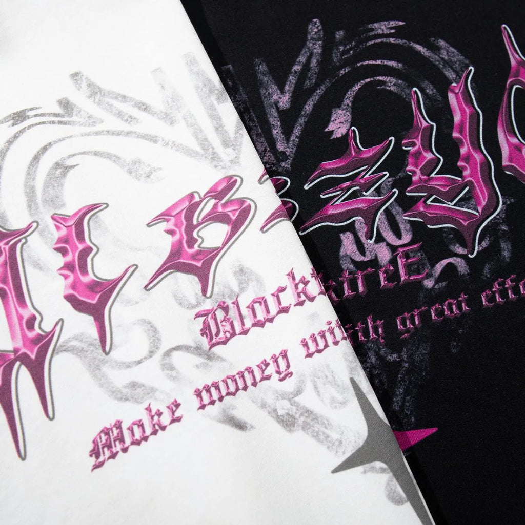 Men's black cotton t-shirt with printed design showing loose fit and short sleeves