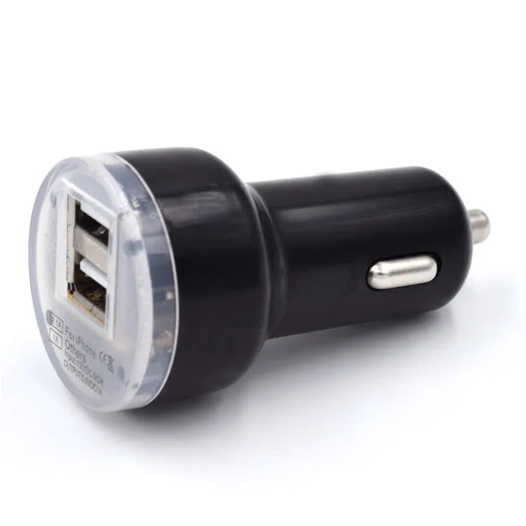 Black and white two-port car charger for a 12V vehicle socket, used for charging phones in the car