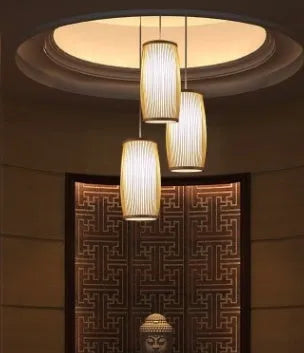 Bamboo hanging lamp with woven rattan shade and E27 fitting for staircase lighting