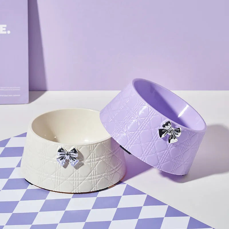 Diamond pattern pet feeding bowl with bowknot design in multiple colour options