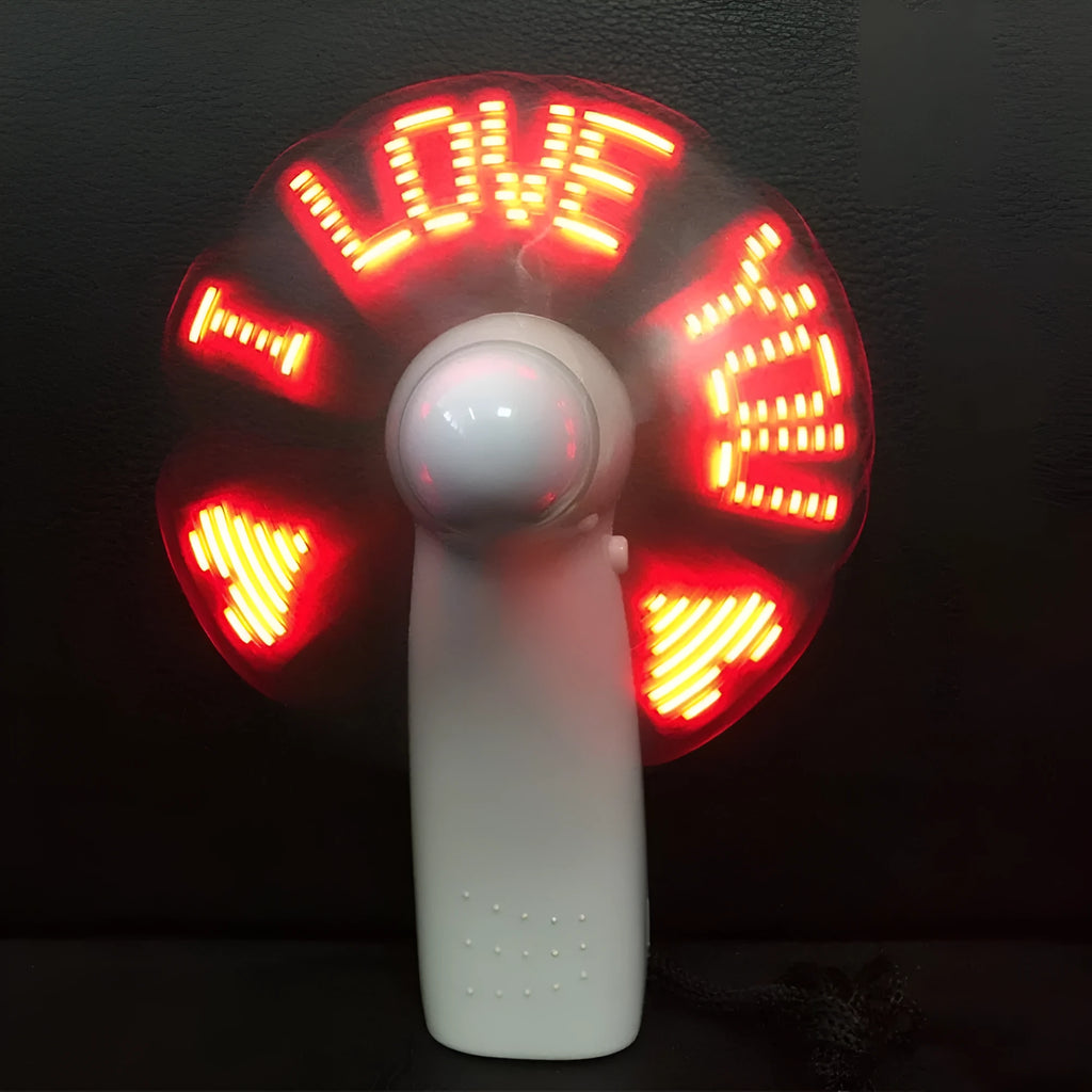 White handheld mini fan with blue and red flashing LED 'I Love You' text display.