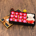 Gift box containing twelve bear-shaped soap flowers styled as roses in assorted colours