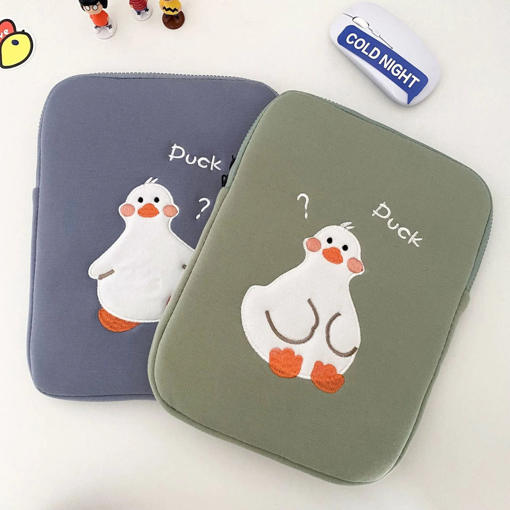 Blue cotton tablet case with embroidered cartoon duck design and a zipper closure.