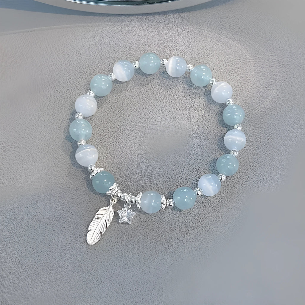 Glass crystal bead bracelet with blue moonlight colour and eight star design elements