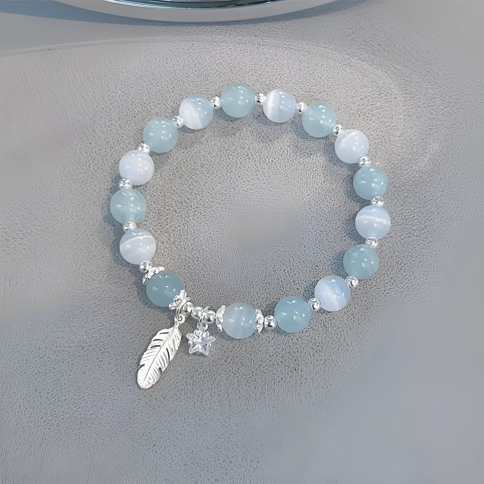 Glass crystal bead bracelet with blue moonlight colour and eight star design elements