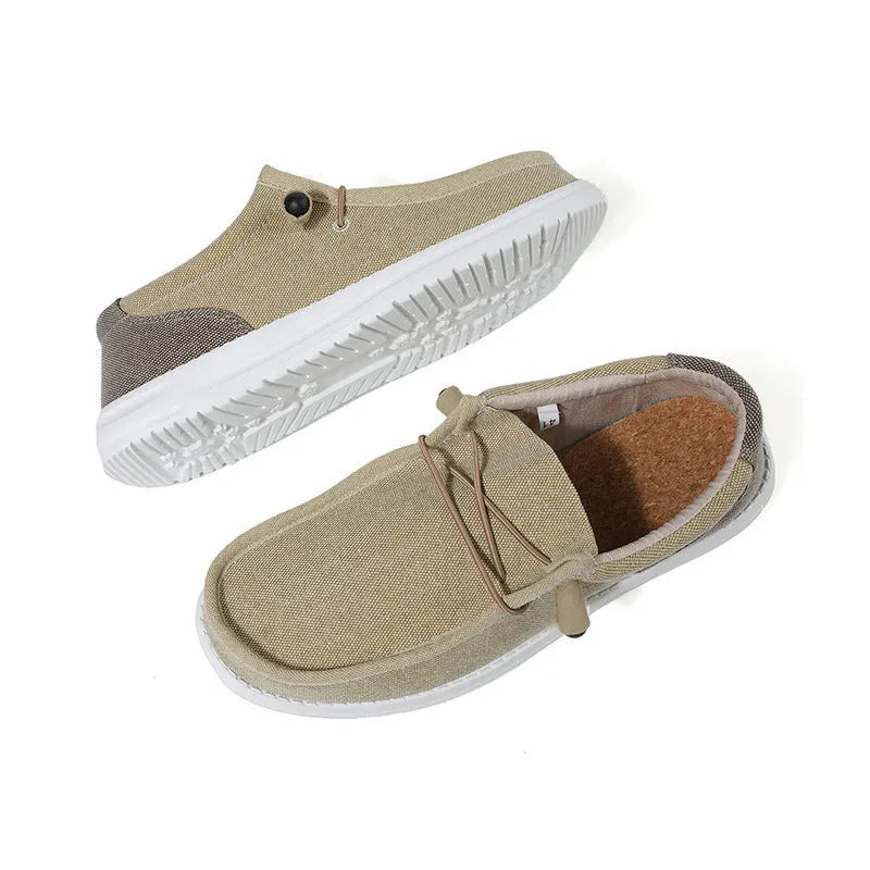 Men's green and orange canvas casual shoes with mosaic design and rubber sole.