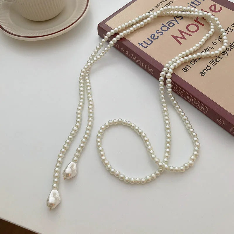 Female vintage retro imitation pearl necklace with geometric shape, adjustable 21-50cm perimeter, available in multiple colours