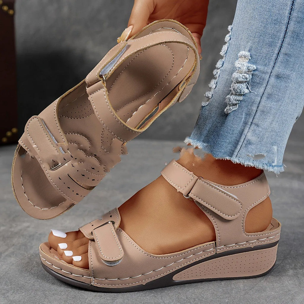 Beige plus size strap sandals with a thick composite sole and adjustable Velcro fastening on a white background