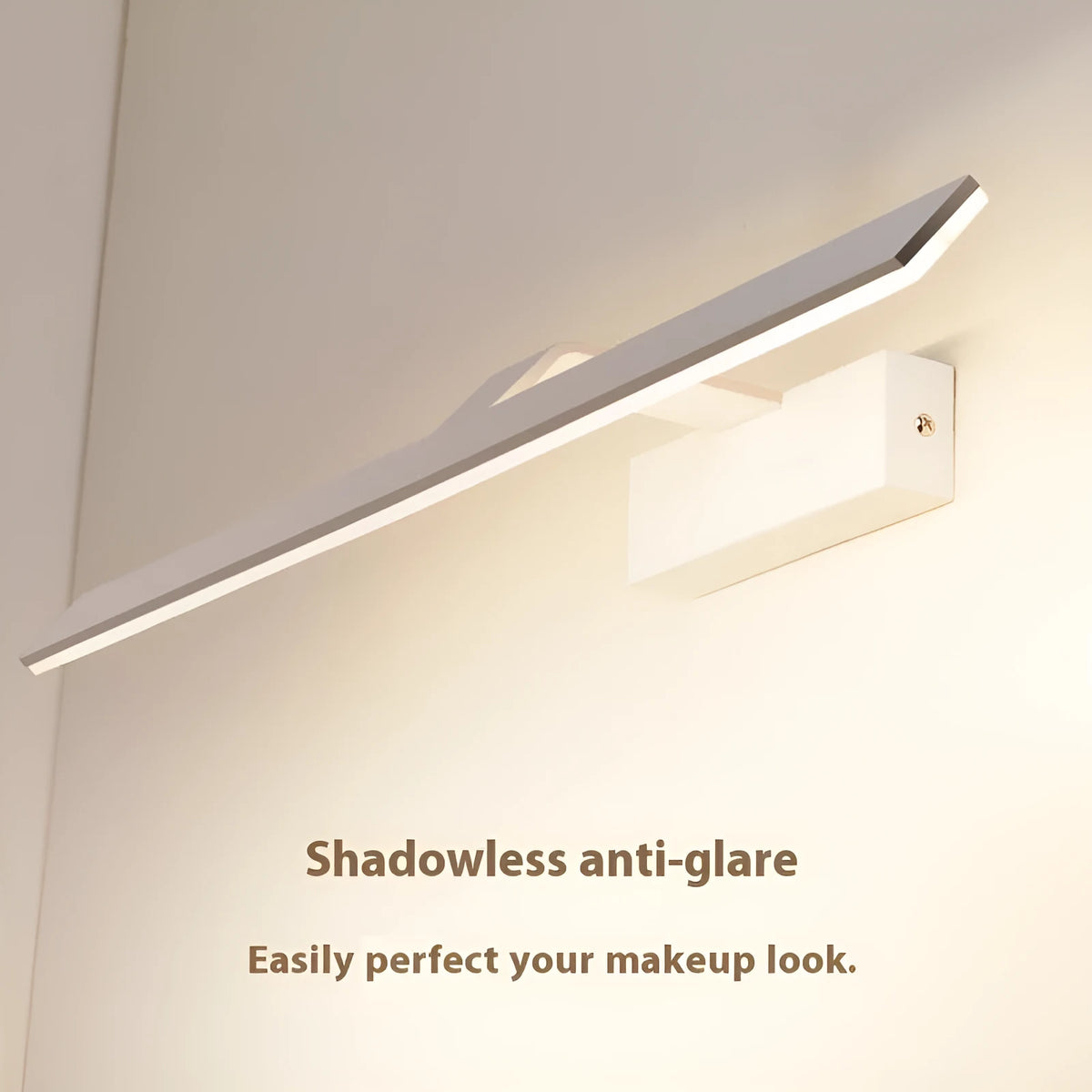 White LED mirror headlight with tri-colour dimming mounted above a bathroom mirror, 520mm length