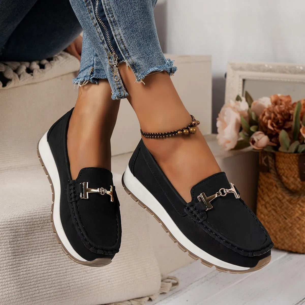 Women's non-slip PU leather loafers in beige with round toe and hollow-out side panels on a white background