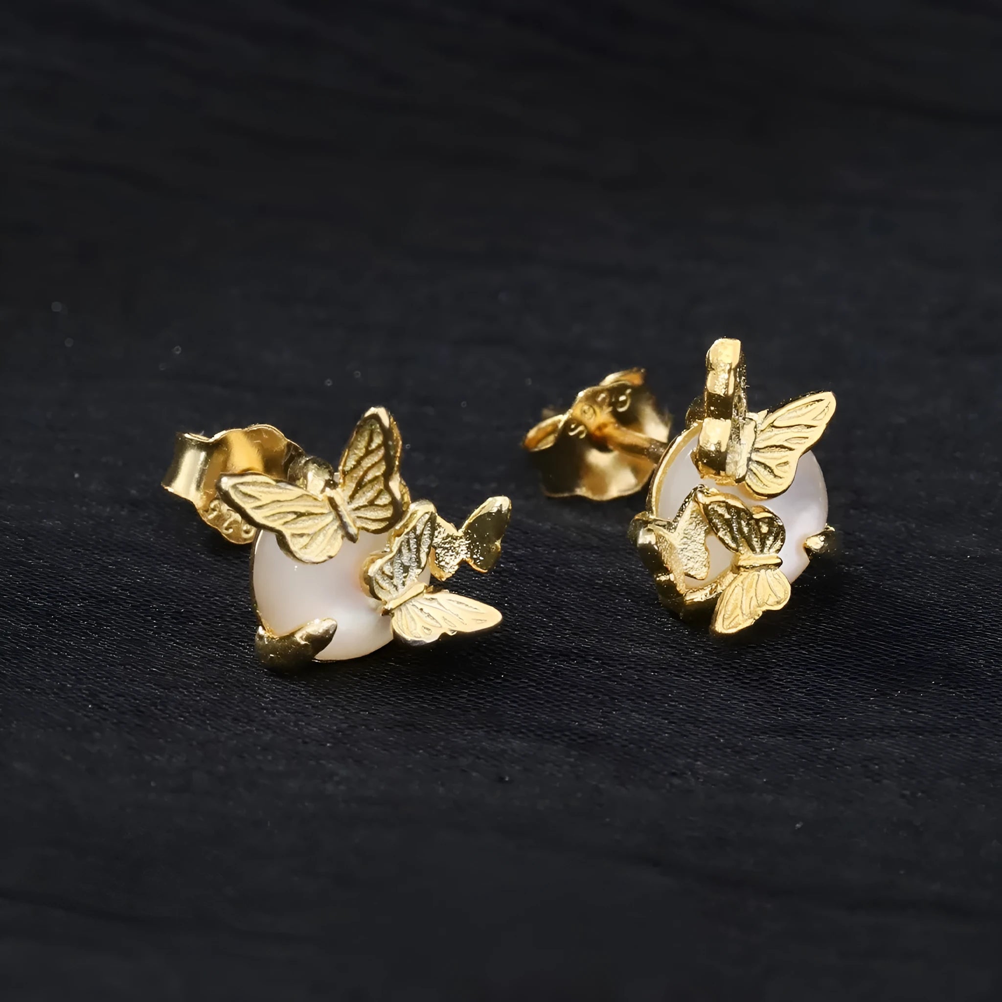 Butterfly design ear studs in 925 silver with electroplated gold or white gold finish