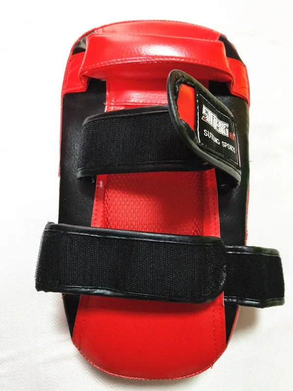 Square black and red hand-held martial arts target pad with strap, showing dimensions.
