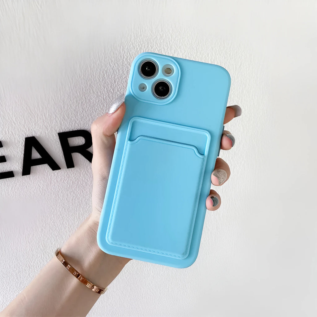 Sky blue colour block silicone iPhone case with a built-in card slot on the back.