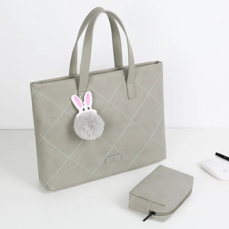 Genuine leather crossbody laptop bag in light gray with nylon lining for 13 to 15 inch laptops