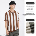Man modelling a black and white striped short sleeve ice silk sweater with a silver zip detail on the front.