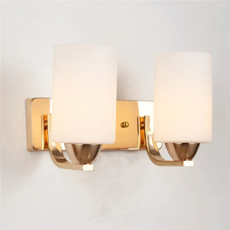 Modern chrome-finished wall lamp with a glass shade, shown in single-head and double-head configurations.