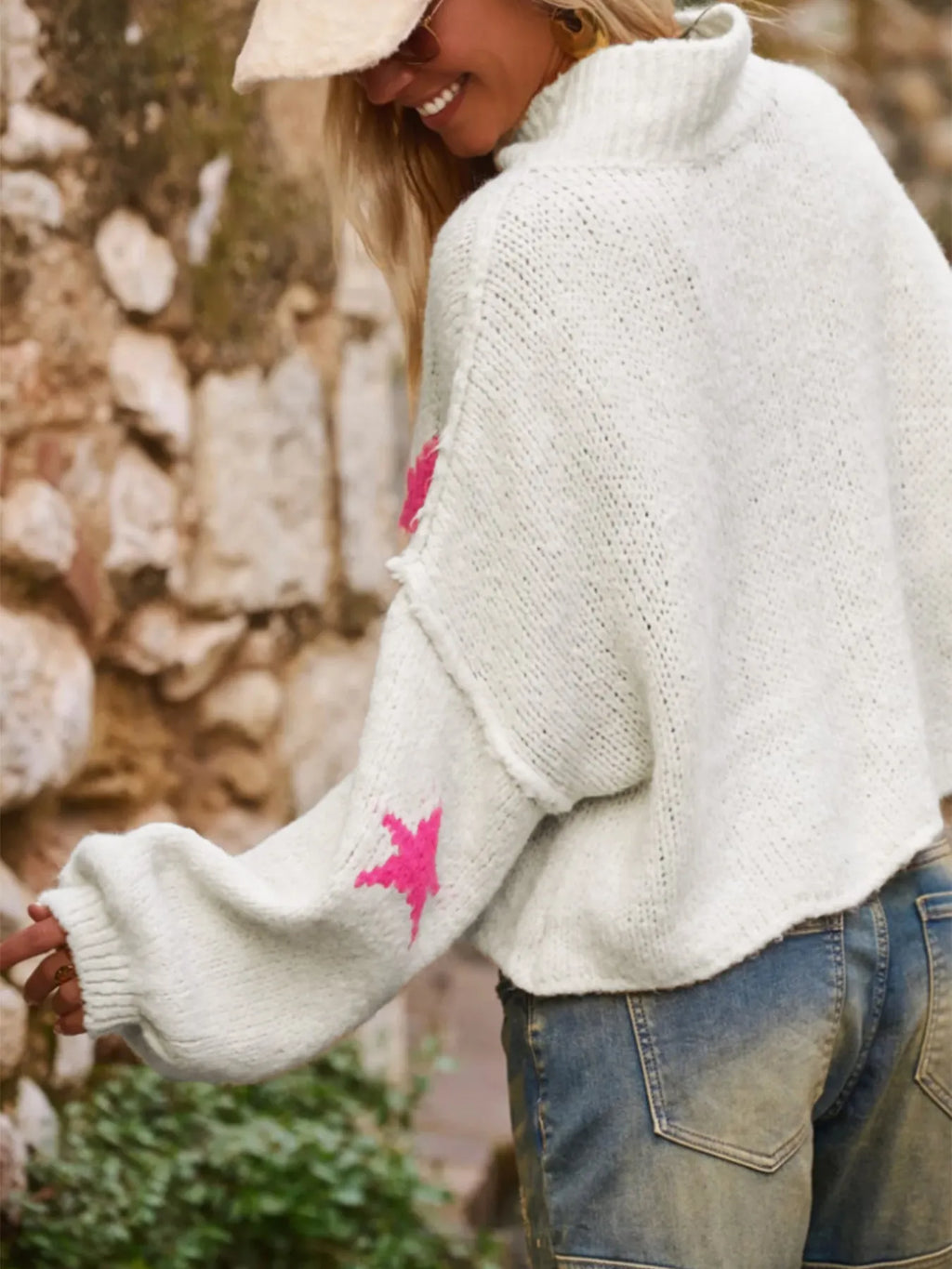 White women's loose turtleneck pullover sweater with a five-pointed star pattern in imitation velvet fabric.