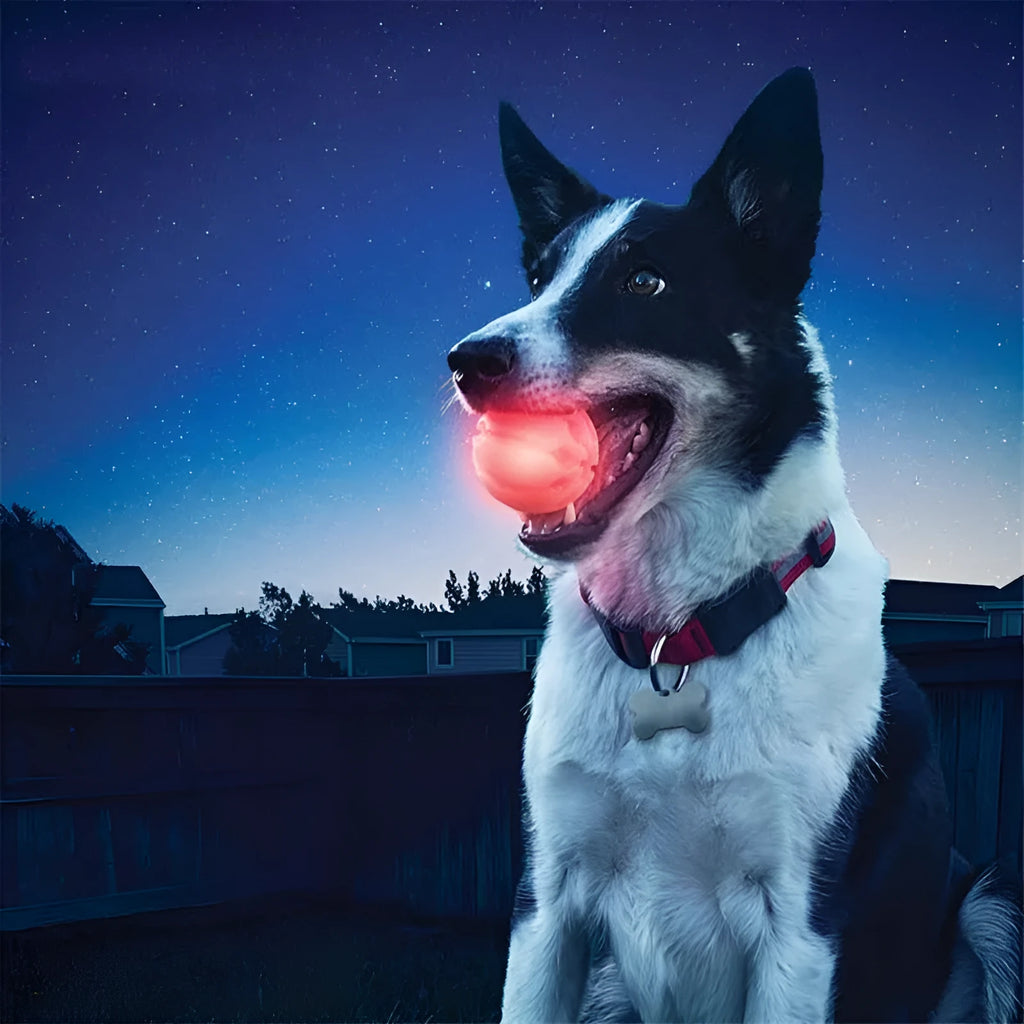 Blue solid honeycomb TPR pet toy ball with luminous flash on a white background