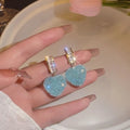 Pink and blue candy heart stud earrings made from alloy metal