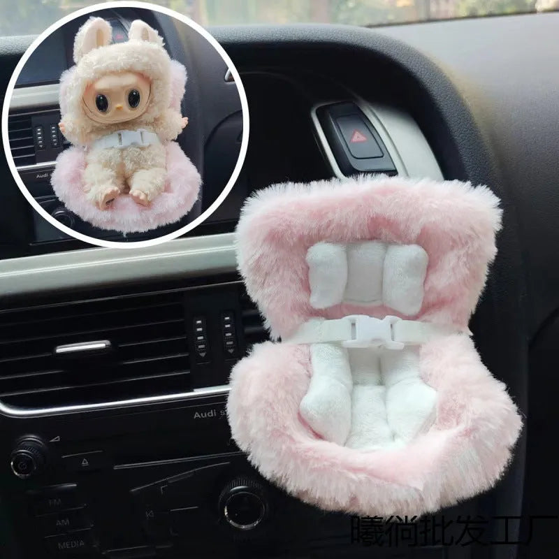 Plastic doll car safety seat ornament in plush Deluxe Edition colour with black safety belt