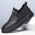 Men's solid colour leather casual shoes with round toe design in black or brown options