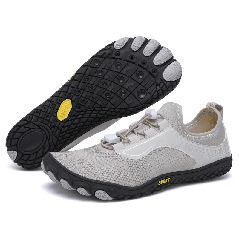 Pair of upstream shoes in 2303 Black with non-slip rubber sole and elastic fabric upper