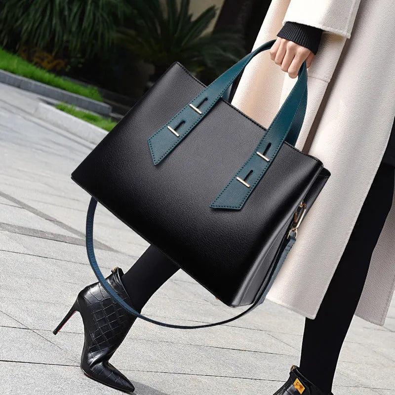 Simple shoulder messenger handbag for women in PU, medium-soft, retro style, available in eight colours including black and beige with blue.