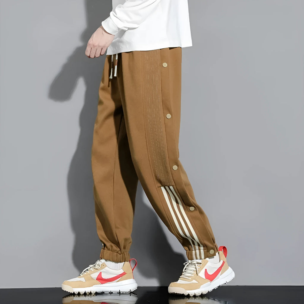 Men's loose black sweatpants with ankle ties and high elastic waistband for sports