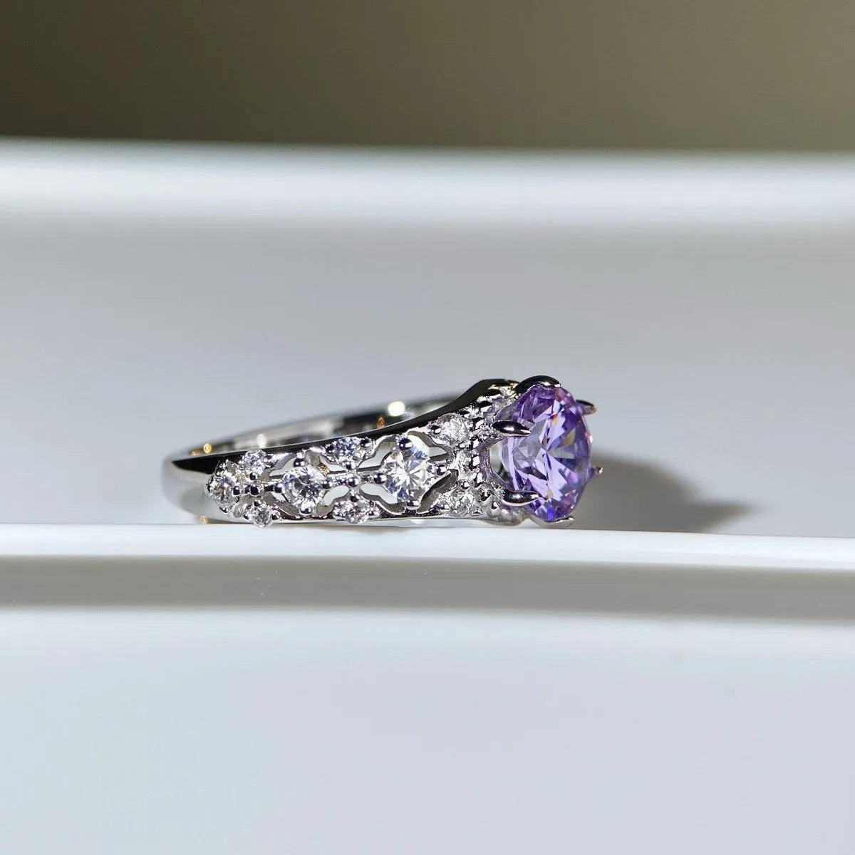 1 karat D colour round moissanite ring in silver or rose gold electroplated silver, US sizes 5 to 9