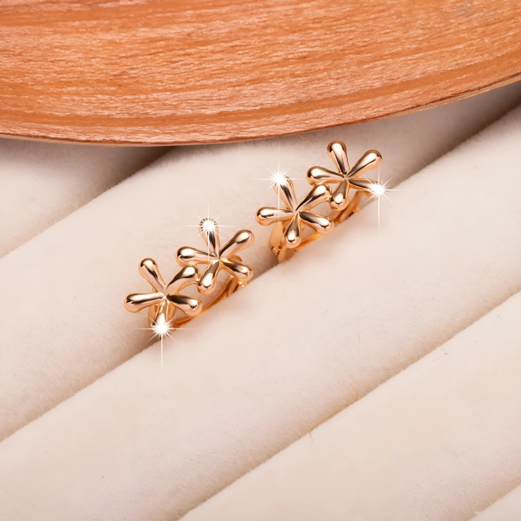Rose gold circular earrings with waterdrop flower design using electroplating for women