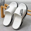 Unisex non-slip PVC beach bathroom slippers in black, open toe, youth trend style