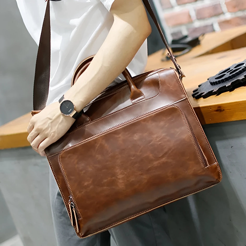 Genuine cowhide leather men's handbag coffee colour Japan Korea style with zipper closure and 14 inch laptop capacity