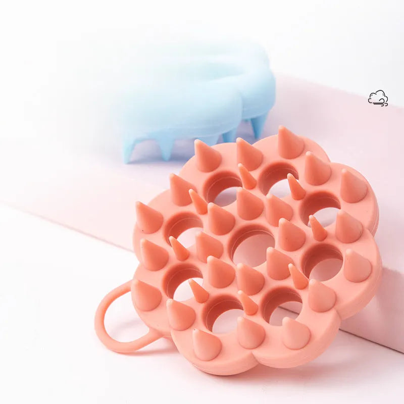 Silicone pet grooming brush with flexible bristles for dogs and cats in five colour options