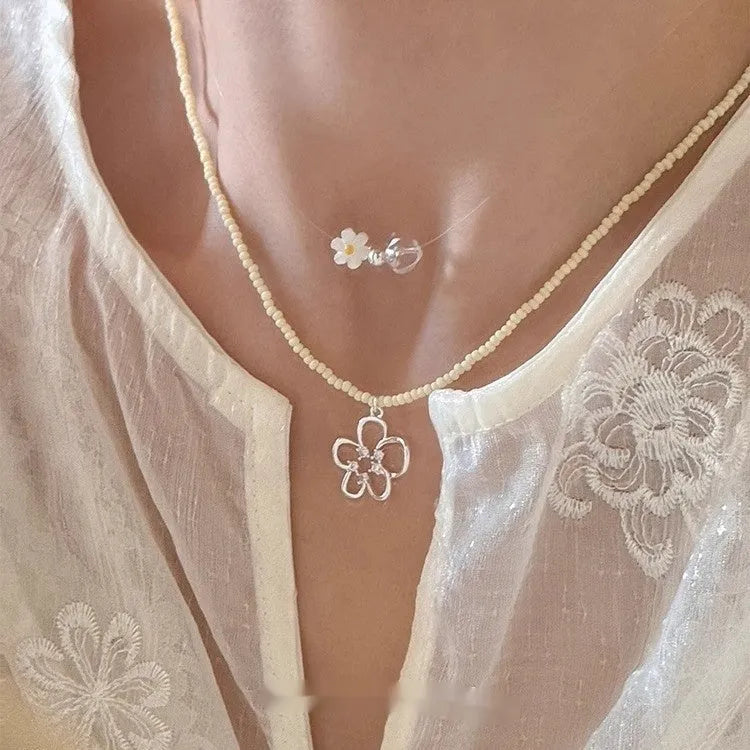 Women's electroplated copper hollow flower necklace with U-shaped pendant and English letters detail