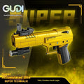 Golden Sand Eagle Gun M416 rifle model built from small particle plastic building blocks, colour box packaging