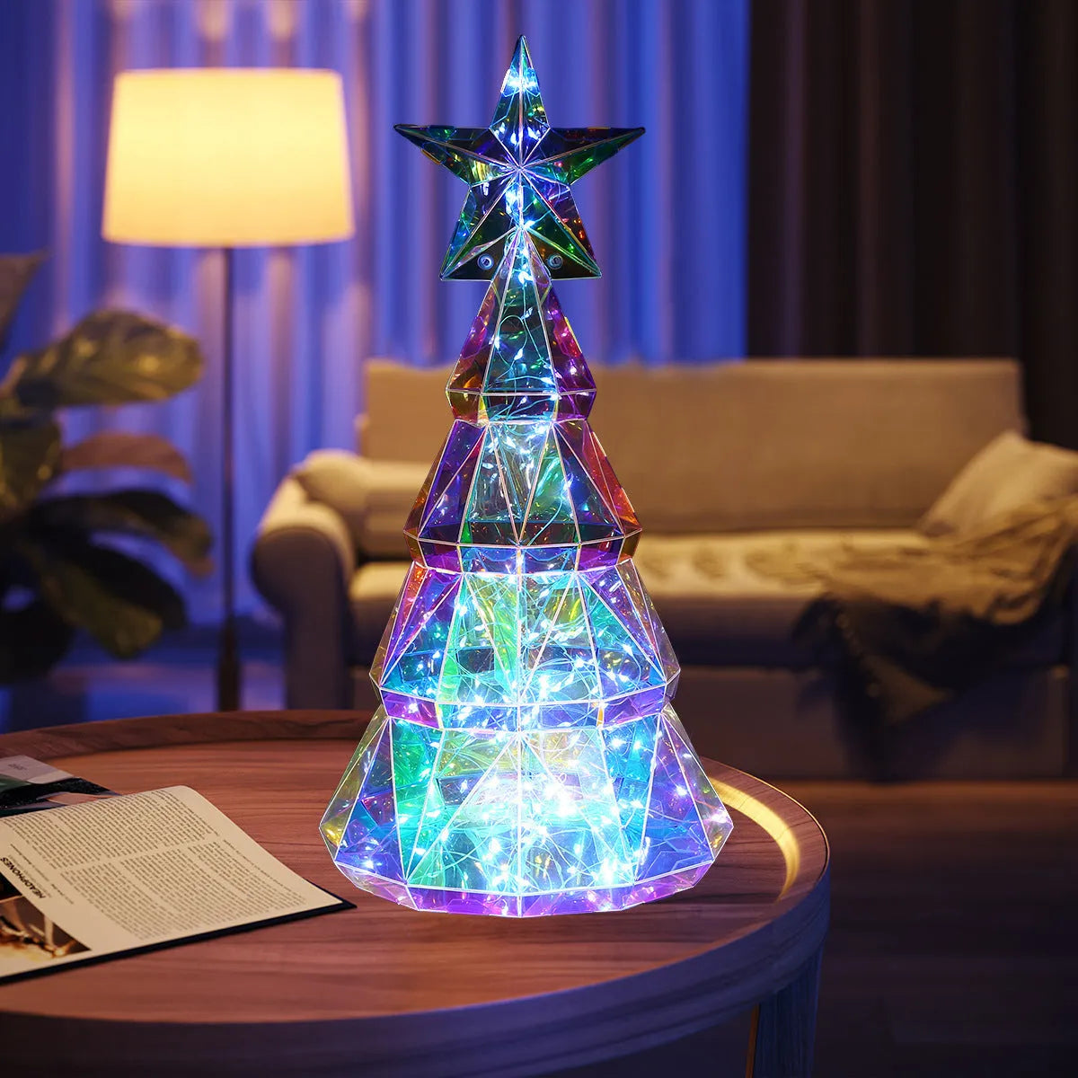 Colourful cartoon-style Christmas tree LED light decoration measuring 20cm high.