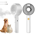 Pink and white cat grooming brush with water tank, stainless steel bristles, and mist spray function