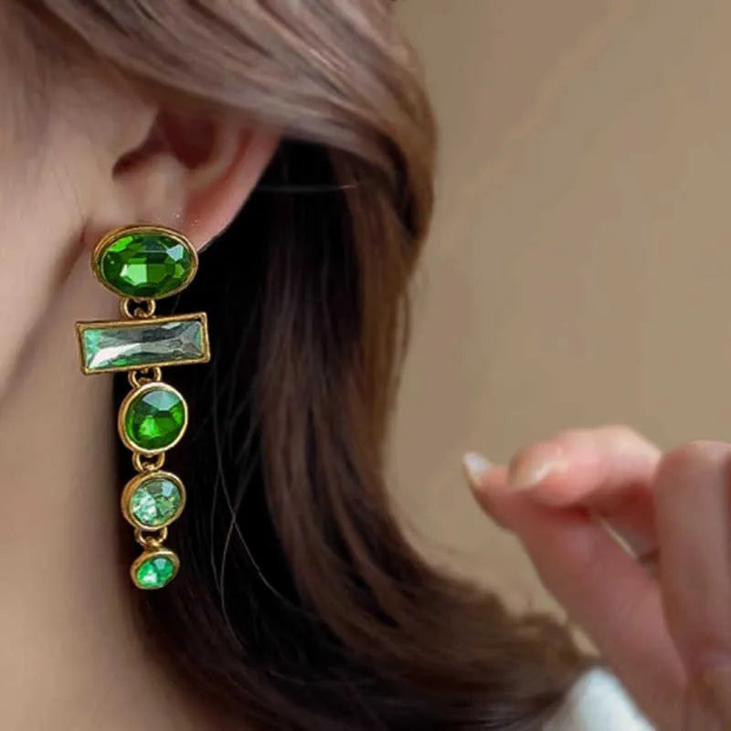 A pair of green gradient geometric earrings with an inlaid zircon stone in a Chinese style.