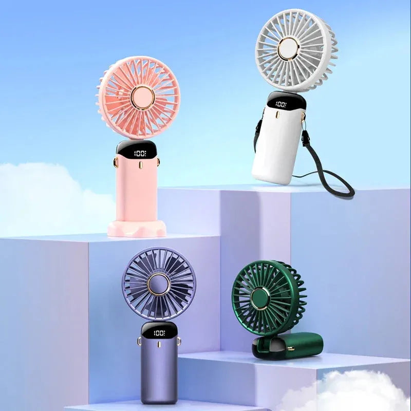Blue portable handheld electric fan showing foldable design, LED display, and included neck lanyard