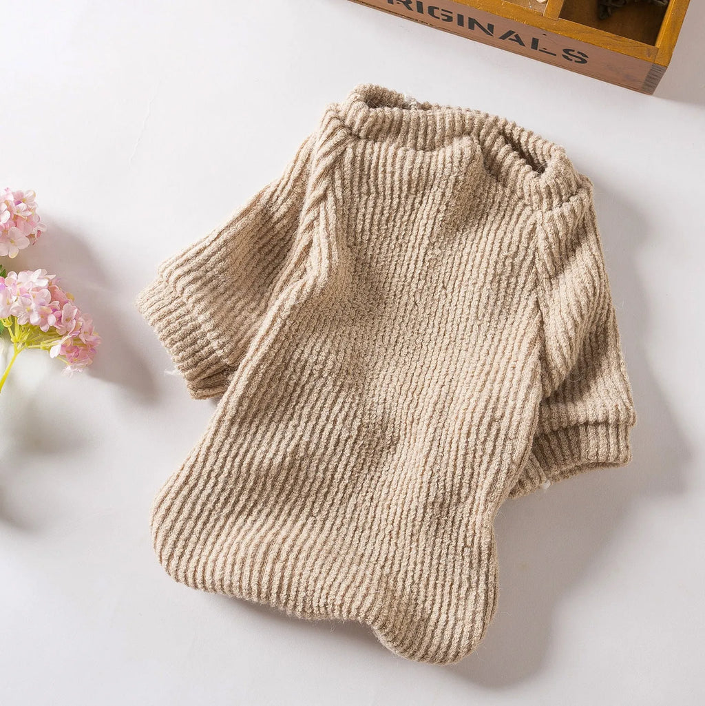 Brown cloth pullover sweater on a small dog, showing casual design and comfortable fit.