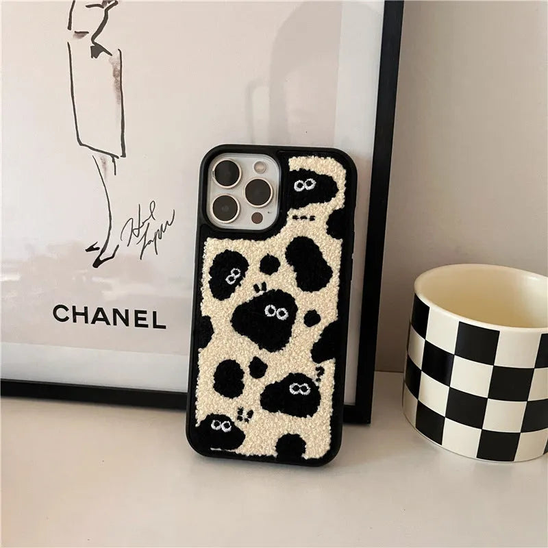 Black plush soft fairy design phone case for iPhone models.