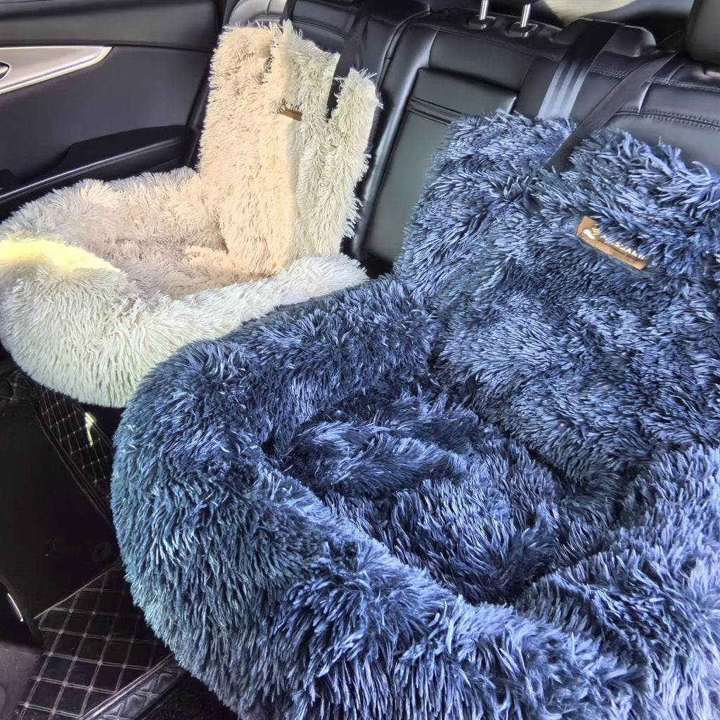 Thick dark grey thermal pet mat placed on a car's back seat, showing its size and removable cloth construction.