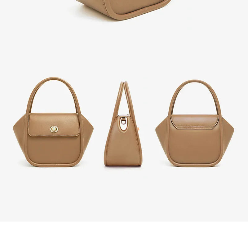Women's leather wing shape tote bag with cross-body strap in four colour options showing buckle detail