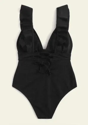 Black one-piece swimsuit for women with ruffled shoulder straps and decorative lace across the back.