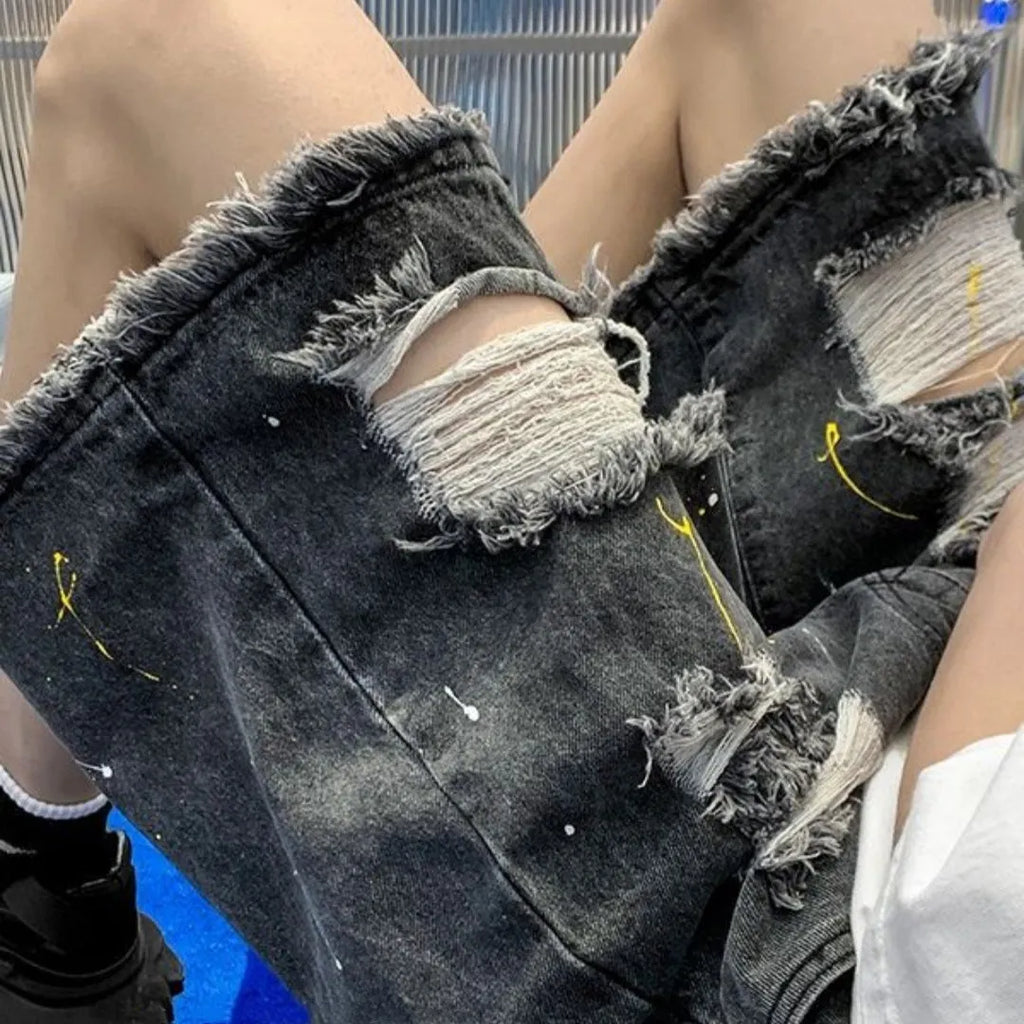 Men's loose fit water washed denim shorts with hole detailing in black and light blue colours