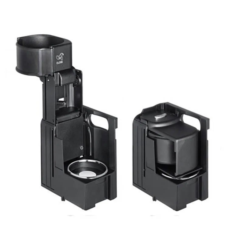 Black Mercedes-Benz genuine cup holder bracket replacement part number 2116800014.