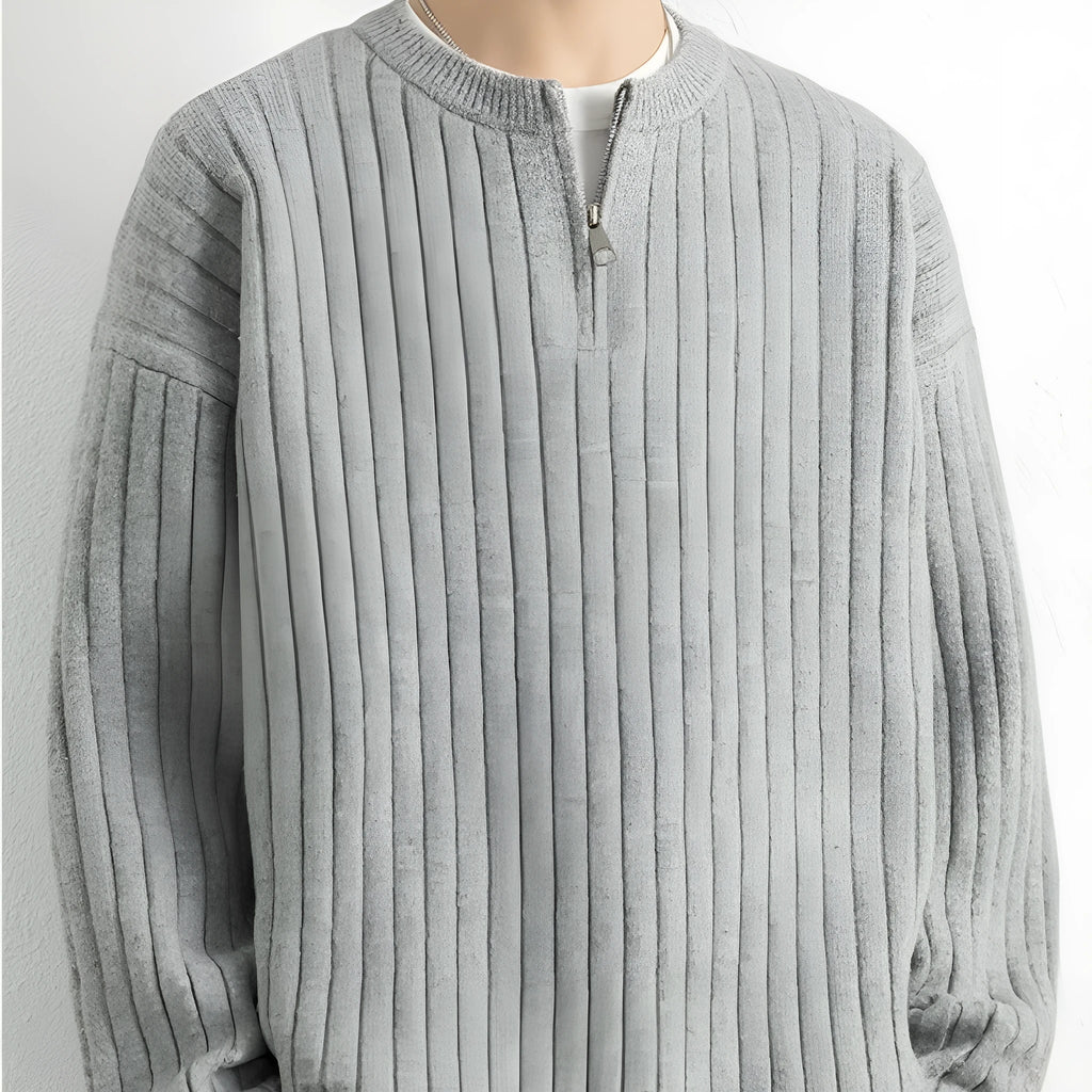 Men's grey half zip loose fit pullover sweater with textured knit on a hanger.