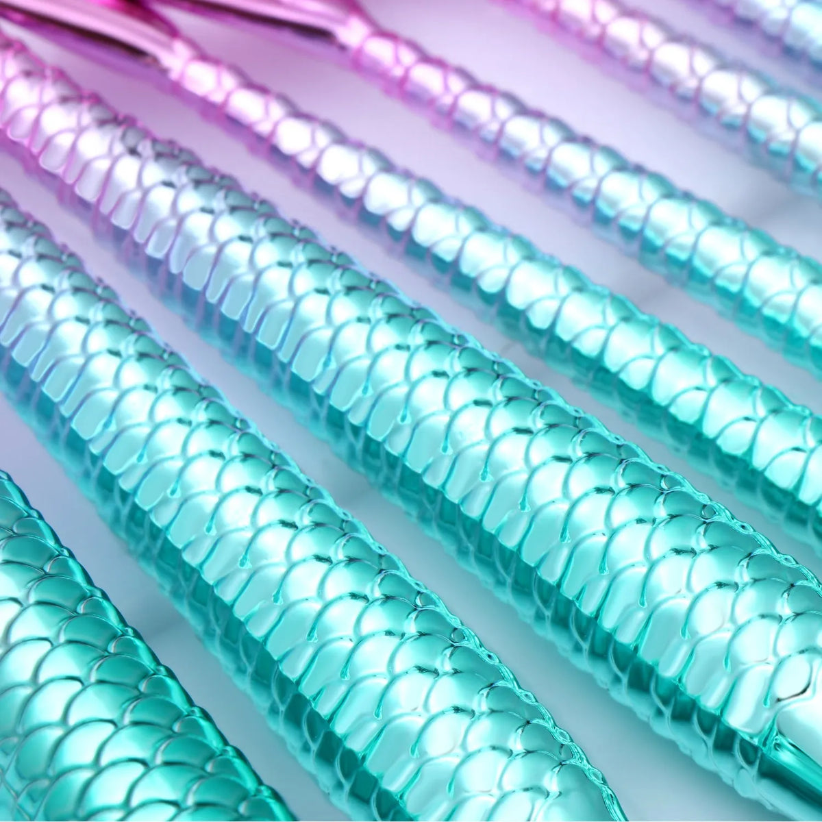 11-piece mermaid makeup brush kit with synthetic bristles, angled and tapered shapes